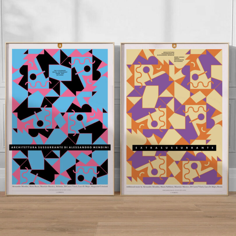 Two geometric art posters with abstract shapes. Left poster features blue and pink tones, right poster features orange and yellow tones. Both are framed and displayed on a wooden floor.