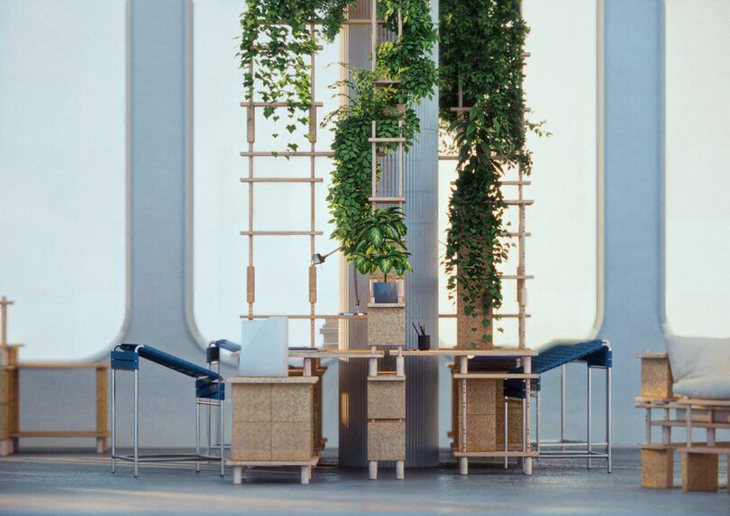 Modern indoor space with vertical green plants, wooden furniture, and blue cushioned chairs arranged around a central pillar