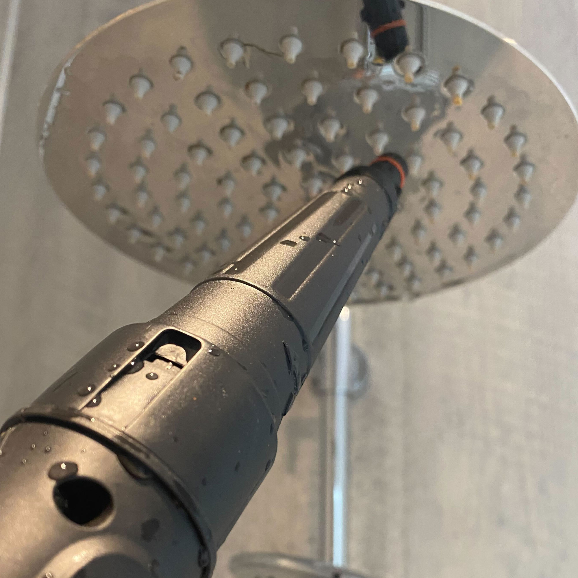 VAX steam fresh total home steam cleaner nozzle on shower head