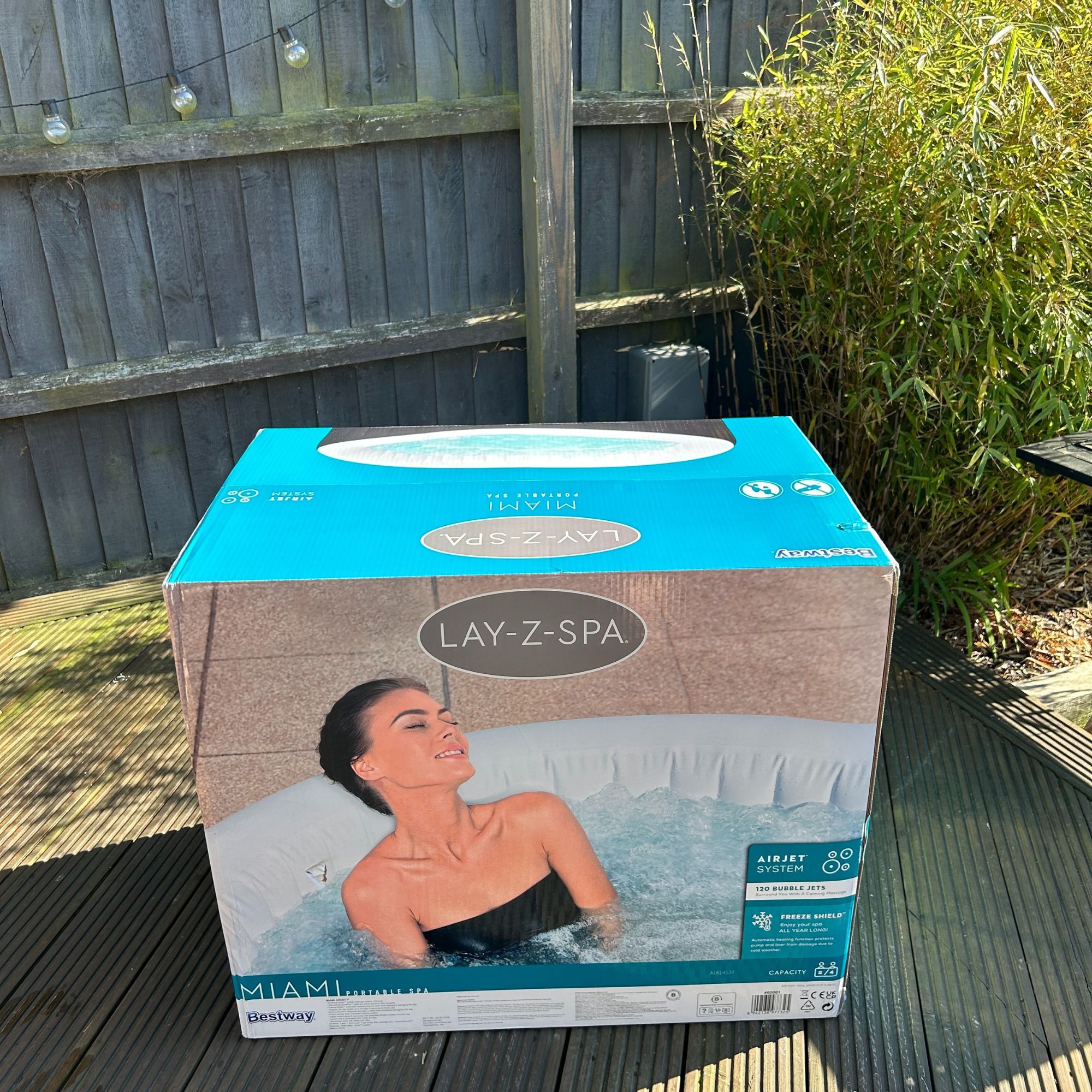 Lay-Z-Spa Miami AirJet in box on decking