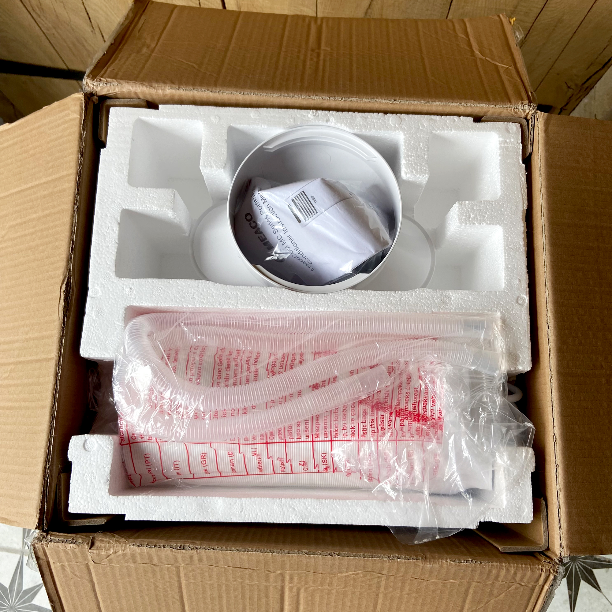 The MeacoCool MC Series 7000BTU Portable Air Conditioner  being unboxed