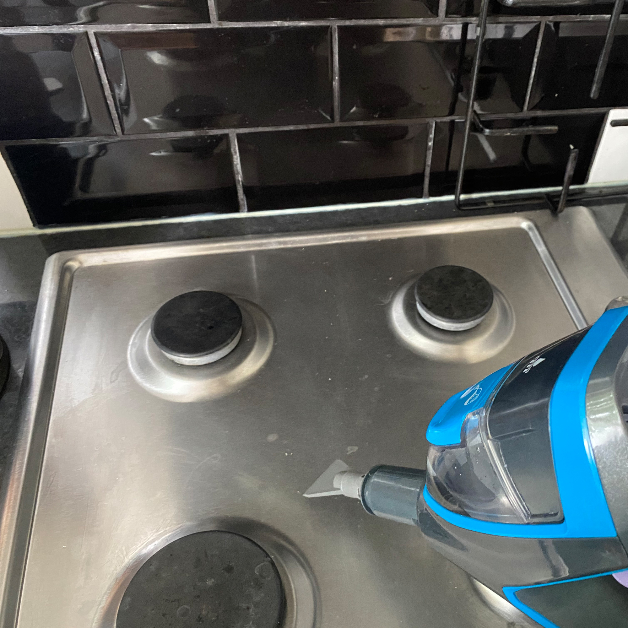 Image of steam cleaner during testing on kitchen hob