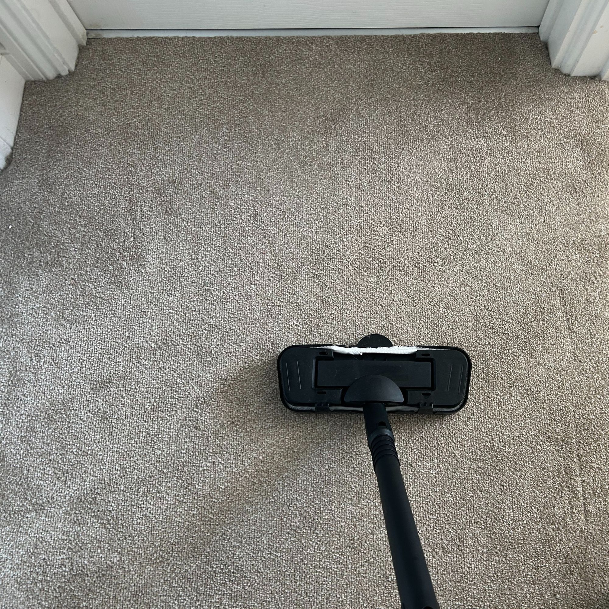 Beldray steam cleaner with carpet glider attachment on carpet