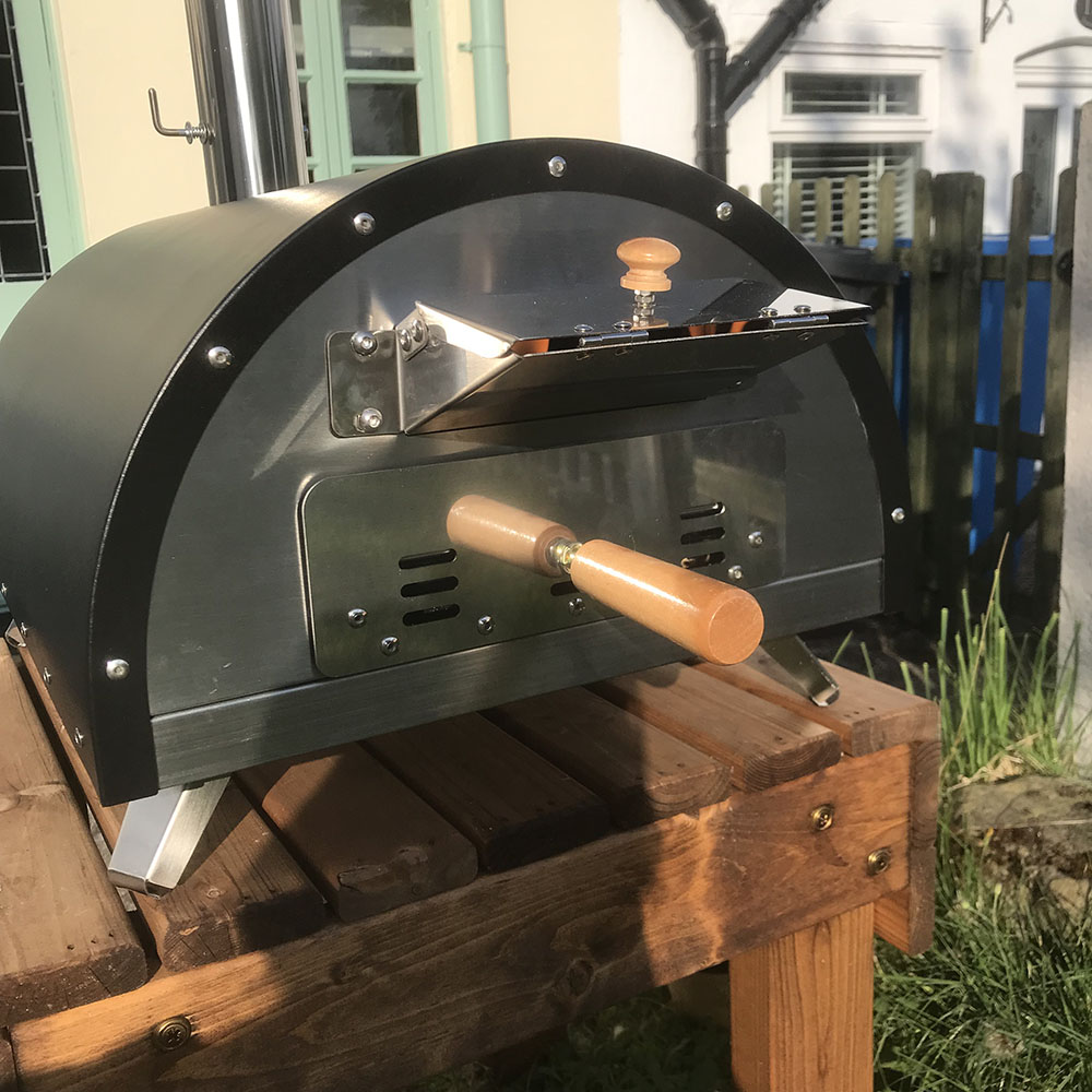 Woody pizza oven hopper and fire box