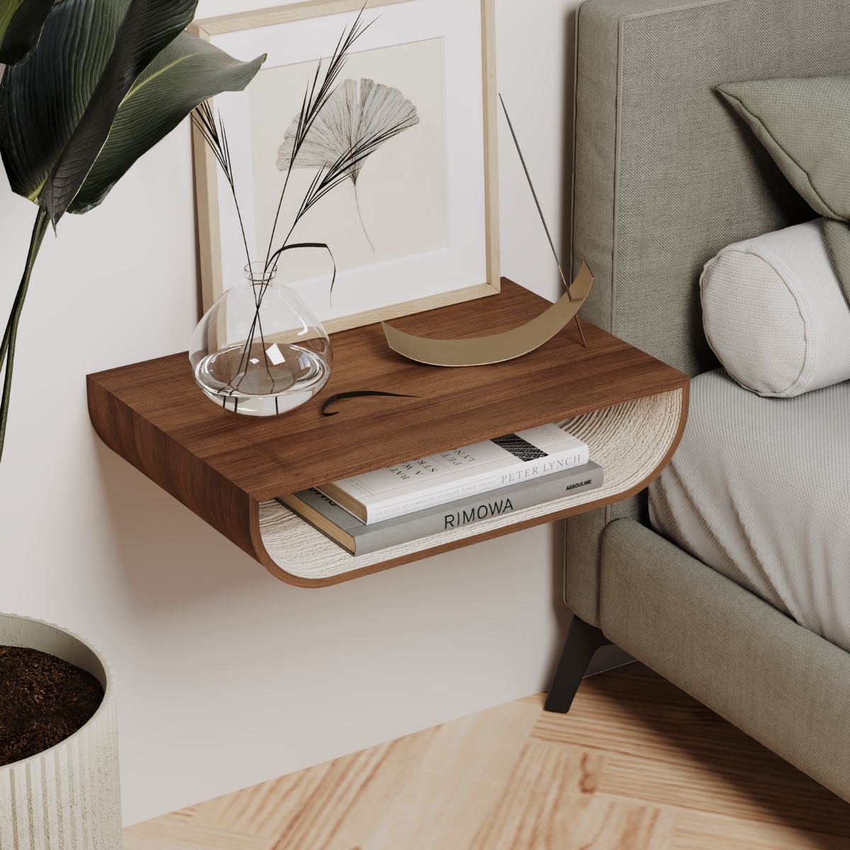 floating nightstand with white interior and walnut finish near a bed with decors and book inside japandi style