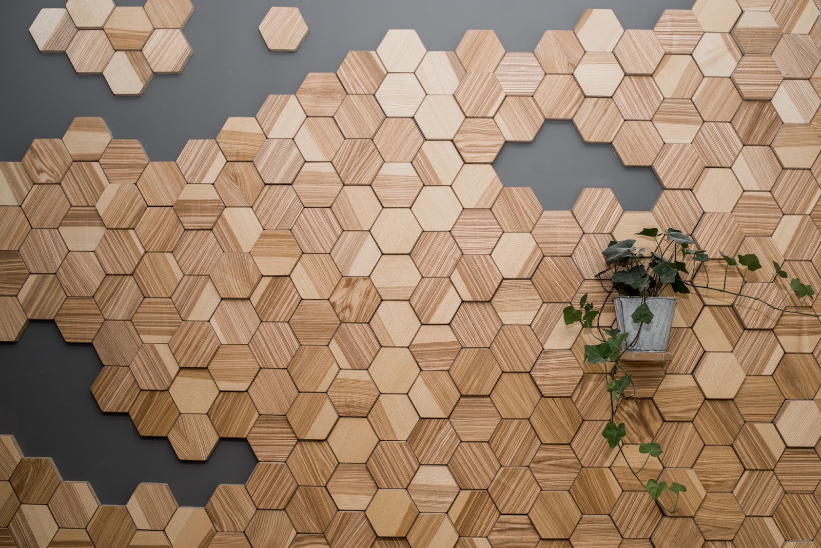 wooden wall hexagon panels creating a mosaic look for wall decor